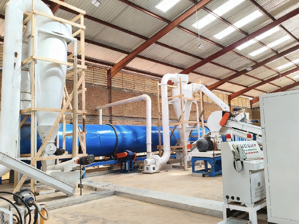 翎琪技术团队赴坦桑尼亚 大型滚筒烘干机成功完成安装试机